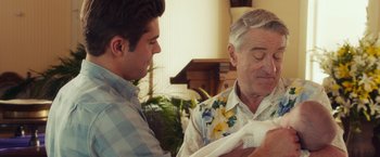 Movie still from “Dirty Grandpa” (2016), directed by Dan Mazer – A man and a boy looking at a cloth; Close Up shot, Over the shoulder angle