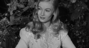 Movie still from “Dead Men Don't Wear Plaid” (1982), directed by Carl Reiner – A black - and - white photo of a woman with long blonde hair; Close Up shot, High angle