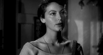 Movie still from “Dead Men Don't Wear Plaid” (1982), directed by Carl Reiner – A black - and - white photo of a woman in a dress; Close Up shot, Low angle