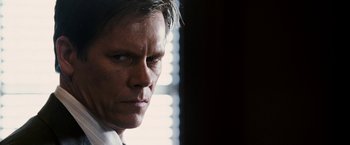 Movie still from “Death Sentence” (2007), directed by James Wan – A person looking at the camera; Close Up shot, Low angle