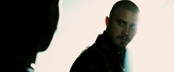 Movie still from “Death Sentence” (2007), directed by James Wan – A man with a bald head is looking at the camera; Close Up shot, Over the shoulder angle