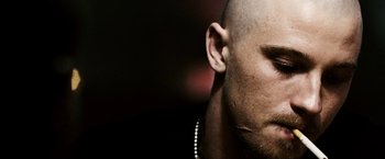 Movie still from “Death Sentence” (2007), directed by James Wan – A man's face with a beard; Close Up shot, Low angle