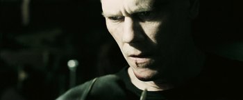 Movie still from “Death Sentence” (2007), directed by James Wan – A man's face in the dark; Close Up shot, Over the shoulder angle