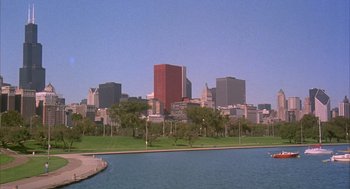Movie still from “Deliver Us from Eva” (2003), directed by Gary Hardwick – A view of a large city from across the water; Extreme Wide shot, High angle