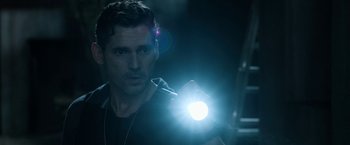 Movie still from “Deliver Us from Evil” (2014), directed by Scott Derrickson – A person holding a flashlight; Close Up shot, Over the shoulder angle