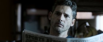 Movie still from “Deliver Us from Evil” (2014), directed by Scott Derrickson – A person reading a newspaper; Close Up shot, Over the shoulder angle