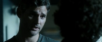 Movie still from “Deliver Us from Evil” (2014), directed by Scott Derrickson – A person wearing a necklace; Close Up shot, Over the shoulder angle