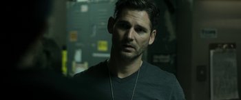 Movie still from “Deliver Us from Evil” (2014), directed by Scott Derrickson – A person wearing a black shirt; Close Up shot, Over the shoulder angle