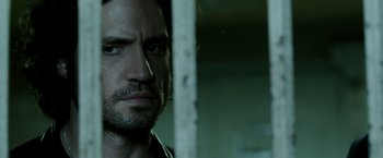 Movie still from “Deliver Us from Evil” (2014), directed by Scott Derrickson – A person looking at the camera; Close Up shot, Over the shoulder angle