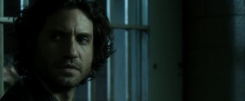 Movie still from “Deliver Us from Evil” (2014), directed by Scott Derrickson – A person with long hair; Close Up shot, Over the shoulder angle