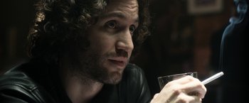 Movie still from “Deliver Us from Evil” (2014), directed by Scott Derrickson – A person holding a wine glass; Close Up shot, Over the shoulder angle