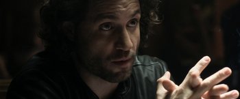 Movie still from “Deliver Us from Evil” (2014), directed by Scott Derrickson – A person wearing a black shirt; Close Up shot, Over the shoulder angle