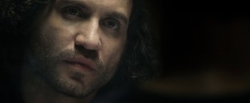 Movie still from “Deliver Us from Evil” (2014), directed by Scott Derrickson – A person with long hair; Extreme Close Up shot, Over the shoulder angle