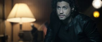 Movie still from “Deliver Us from Evil” (2014), directed by Scott Derrickson – A person wearing a black jacket; Close Up shot, Over the shoulder angle