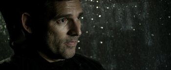 Movie still from “Deliver Us from Evil” (2014), directed by Scott Derrickson – A person looking at the camera; Close Up shot, Over the shoulder angle