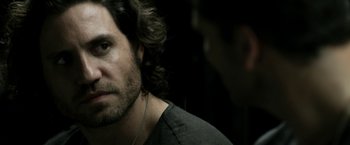 Movie still from “Deliver Us from Evil” (2014), directed by Scott Derrickson – A person wearing headphones; Close Up shot, Over the shoulder angle