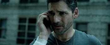 Movie still from “Deliver Us from Evil” (2014), directed by Scott Derrickson – A person talking on a cell phone; Close Up shot, Over the shoulder angle