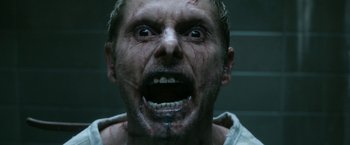 Movie still from “Deliver Us from Evil” (2014), directed by Scott Derrickson – A person with blood on their face; Close Up shot, Low angle
