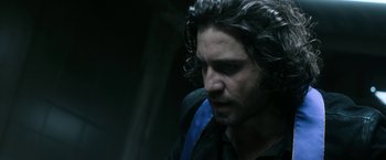 Movie still from “Deliver Us from Evil” (2014), directed by Scott Derrickson – A person with long dark hair; Close Up shot, Over the shoulder angle