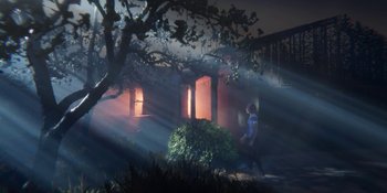 Movie still from “Demonic” (2021), directed by Neill Blomkamp – A person walking in front of a house at night; Extreme Wide shot, Over the shoulder angle