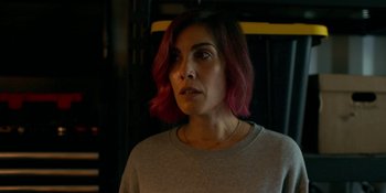 Movie still from “Demonic” (2021), directed by Neill Blomkamp – A person with pink hair; Close Up shot, Over the shoulder angle