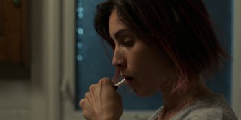 Movie still from “Demonic” (2021), directed by Neill Blomkamp – A person brushing her teeth; Close Up shot, High angle
