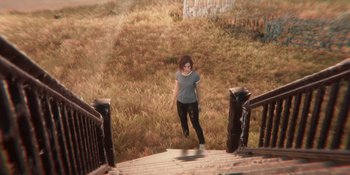 Movie still from “Demonic” (2021), directed by Neill Blomkamp – A woman standing on the stairs of a wooden platform; Wide shot, High angle