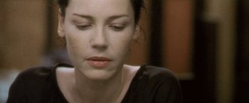 Movie still from “Demonlover” (2002), directed by Olivier Assayas – A person with her eyes closed; Close Up shot, High angle