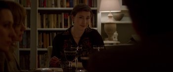 Movie still from “Denial” (2016), directed by Mick Jackson – A woman sitting in front of a computer at a table; Medium shot, Over the shoulder angle