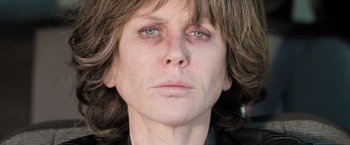 Movie still from “Destroyer” (2018), directed by Karyn Kusama – A woman's face with blue eyes; Close Up shot, Low angle