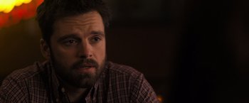 Movie still from “Destroyer” (2018), directed by Karyn Kusama – A person wearing a shirt; Close Up shot, Over the shoulder angle