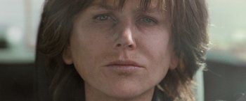 Movie still from “Destroyer” (2018), directed by Karyn Kusama – A woman's face with green eyes; Close Up shot, Low angle