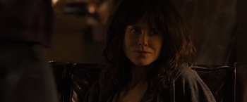 Movie still from “Destroyer” (2018), directed by Karyn Kusama – A person with long hair; Close Up shot, Over the shoulder angle