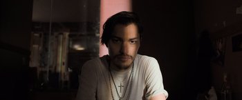 Movie still from “Destroyer” (2018), directed by Karyn Kusama – A person with a cross necklace; Close Up shot, Low angle