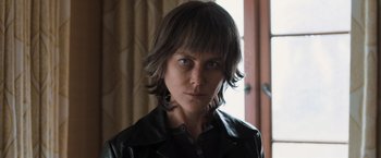 Movie still from “Destroyer” (2018), directed by Karyn Kusama – A person wearing a leather jacket; Close Up shot, Low angle