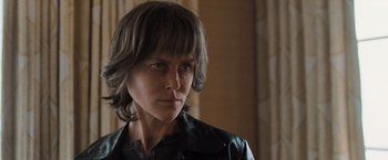 Movie still from “Destroyer” (2018), directed by Karyn Kusama – A person wearing a leather jacket; Close Up shot, Over the shoulder angle