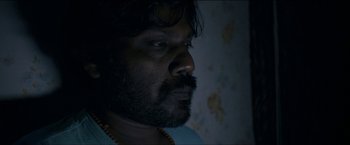 Movie still from “Dheepan” (2015), directed by Jacques Audiard – A person with a beard; Close Up shot, Low angle