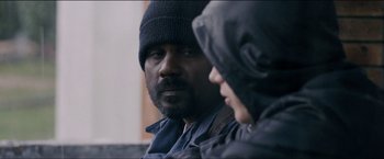 Movie still from “Dheepan” (2015), directed by Jacques Audiard – A man and a woman are looking at each other; Close Up shot, Over the shoulder angle