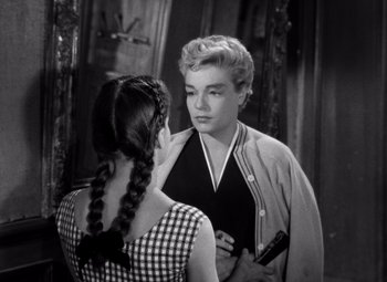 Movie still from “Diabolique” (1955), directed by Henri-Georges Clouzot – A man and a woman talking to each other; Close Up shot, Over the shoulder angle