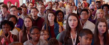 Movie still from “Diary of a Wimpy Kid: The Long Haul” (2017), directed by David Bowers – A group of people standing in a room; Medium shot, High angle