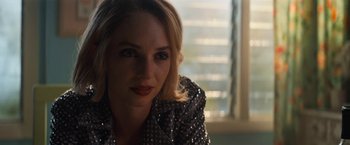 Movie still from “Do Revenge” (2022), directed by Jennifer Kaytin Robinson – A person wearing a jacket; Close Up shot, Over the shoulder angle