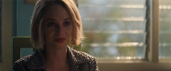 Movie still from “Do Revenge” (2022), directed by Jennifer Kaytin Robinson – A person wearing a jacket; Close Up shot, Over the shoulder angle