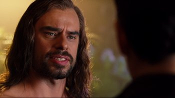 Movie still from “Dinner for Schmucks” (2010), directed by Jay Roach – A person with long hair and a beard; Close Up shot, Over the shoulder angle