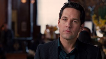 Movie still from “Dinner for Schmucks” (2010), directed by Jay Roach – A man in a suit and tie; Close Up shot, Over the shoulder angle