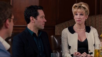 Movie still from “Dinner for Schmucks” (2010), directed by Jay Roach – A man and a woman sitting at a table in front of each other; Medium shot, Over the shoulder angle