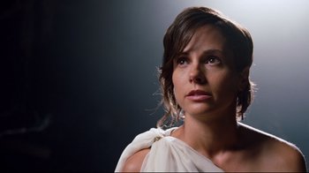 Movie still from “Dinner for Schmucks” (2010), directed by Jay Roach – A woman in a white dress looking to her left; Close Up shot, Low angle