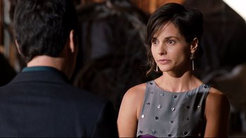 Movie still from “Dinner for Schmucks” (2010), directed by Jay Roach – A woman in a dress and a man in a suit; Close Up shot, Over the shoulder angle
