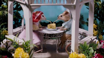 Movie still from “Dinner for Schmucks” (2010), directed by Jay Roach – A couple of mice sitting at a table with a piece of cheese in front of them; Wide shot, High angle
