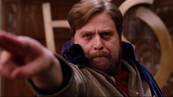 Movie still from “Dinner for Schmucks” (2010), directed by Jay Roach – A person with a beard pointing at the camera; Close Up shot, Low angle