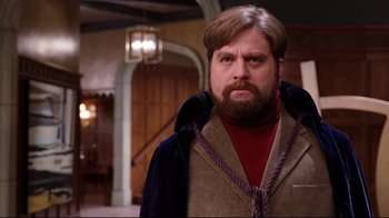 Movie still from “Dinner for Schmucks” (2010), directed by Jay Roach – A person with a beard; Medium shot, Over the shoulder angle